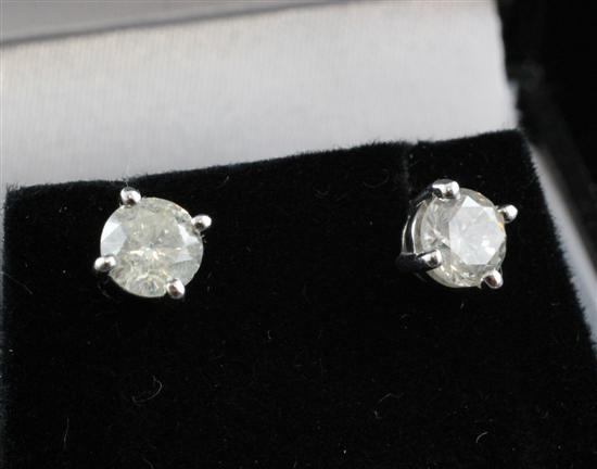 A pair of 18ct white gold solitaire