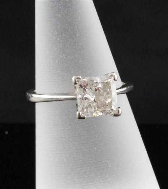 An 18ct white gold square cut solitaire