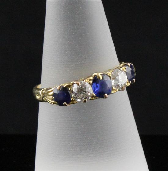 An 18ct gold sapphire and diamond