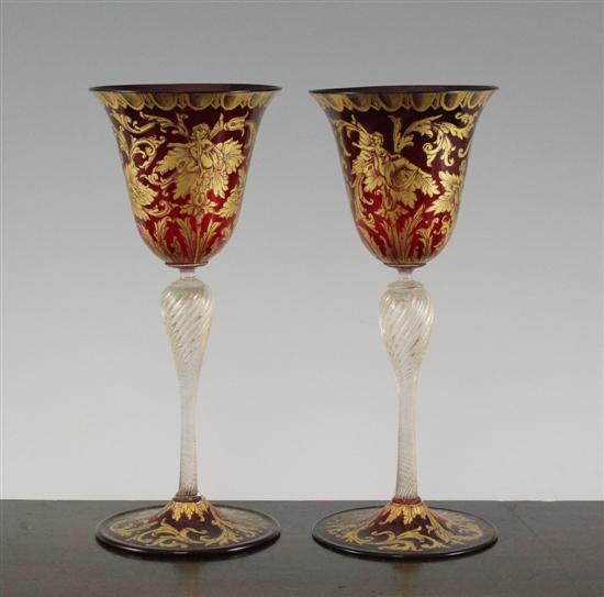 A pair of Venetian gilt decorated ruby