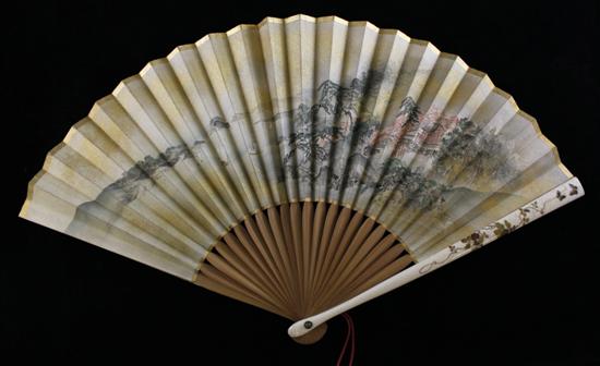 A Japanese painted silk leaf fan