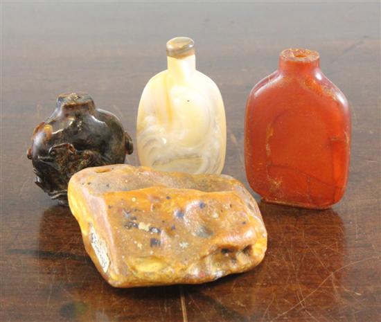 Three Chinese amber snuff bottles