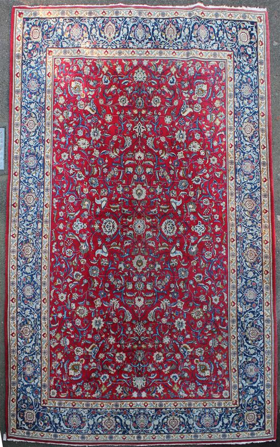 A Kashan carpet with field of scrolling