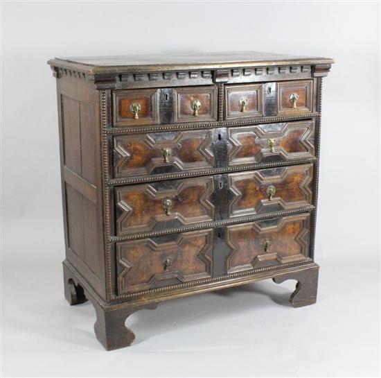 An early 18th century oak and walnut