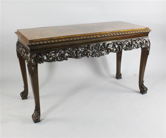 An early 20th century carved walnut