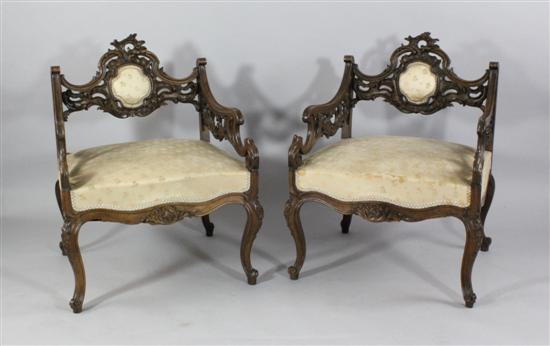 A pair of French carved beech low