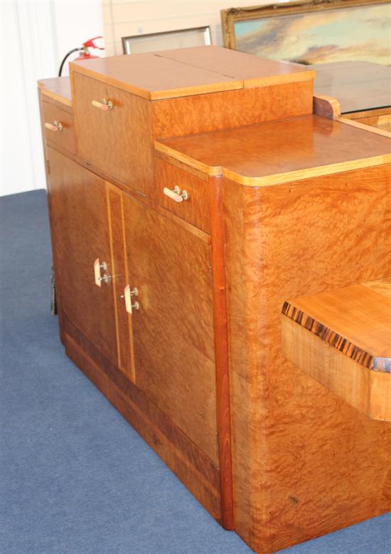 An Art Deco maple cocktail cabinet