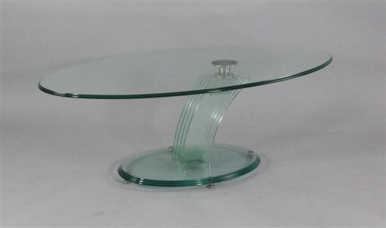 A 1980 s glass oval coffee table 1718f3