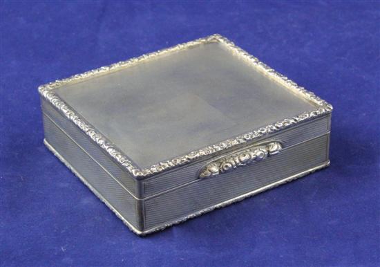 A 1930's silver square cigarette