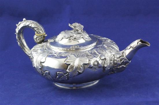 A George IV silver teapot of squat