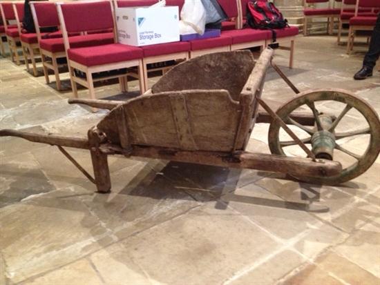 A rustic wooden wheelbarrow c.1950