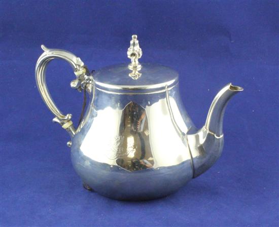 A George V silver teapot of plain