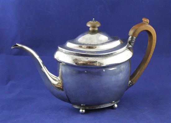 A George III silver teapot of oval