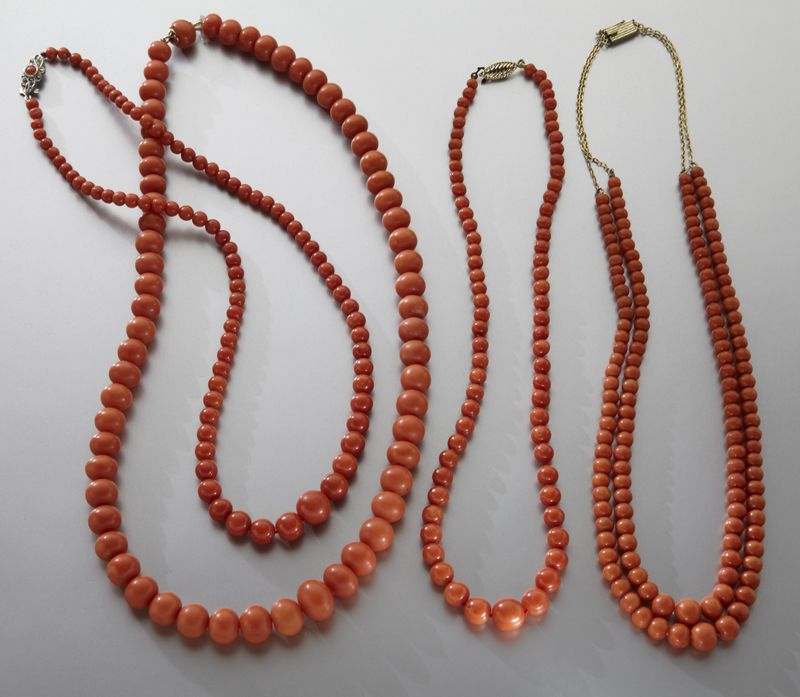 (4) Chinese carved red coral necklaces(This