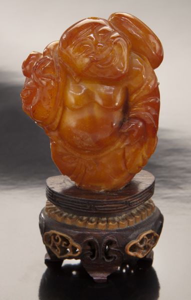 Chinese Qing carved Mila amber