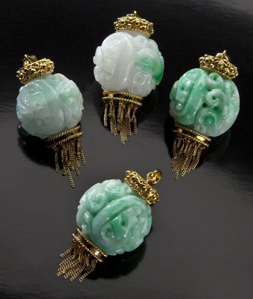  4 Chinese carved jadeite pendants 174446