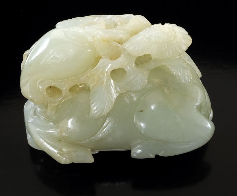 Chinese Qing carved jade deer holding 174504