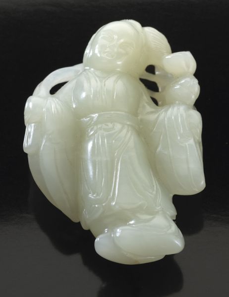 Chinese Qing carved jade figuredepicting