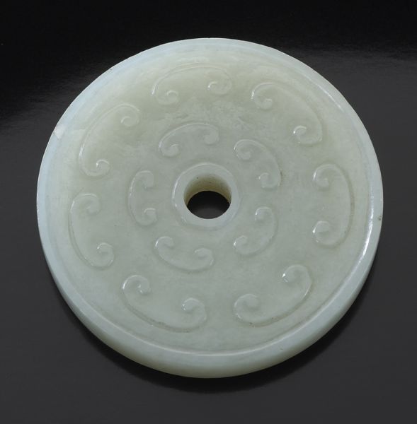 Chinese Ming carved jade bi-diskdepicting