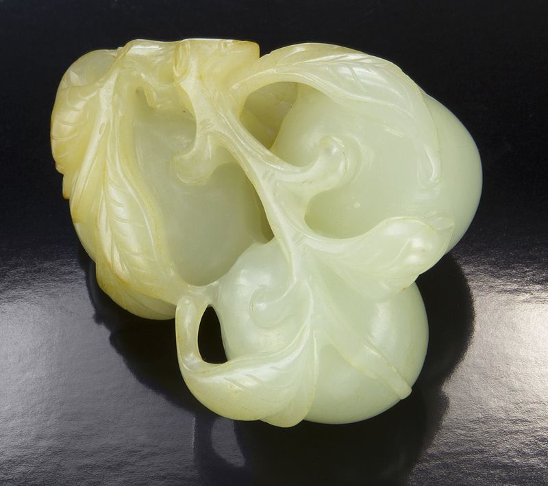 Chinese Qing carved jade toggledepicting