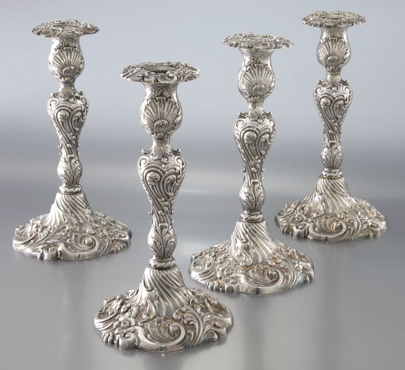 (4) Tiffany and Co. silver plate candlesticksdecorated