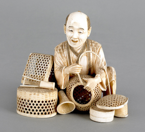 Japanese carved ivory figure of a basket