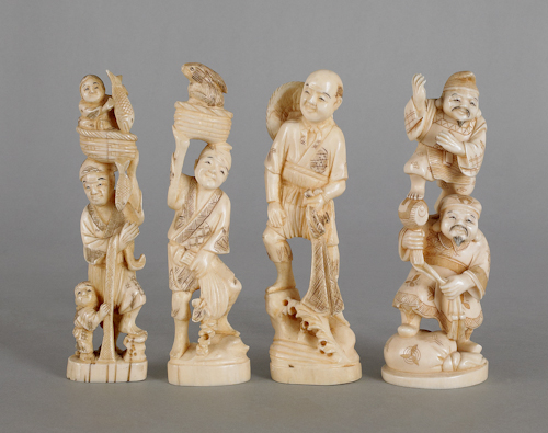 Four Japanese carved ivory figures ca.