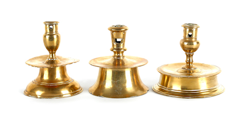 Three brass capstan candlesticks