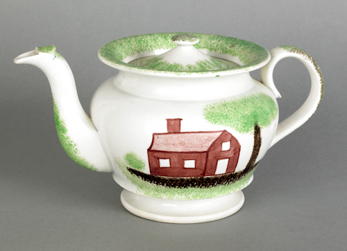 Green spatter teapot with a schoolhouse