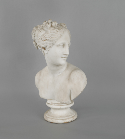Carved white marble bust of a woman
