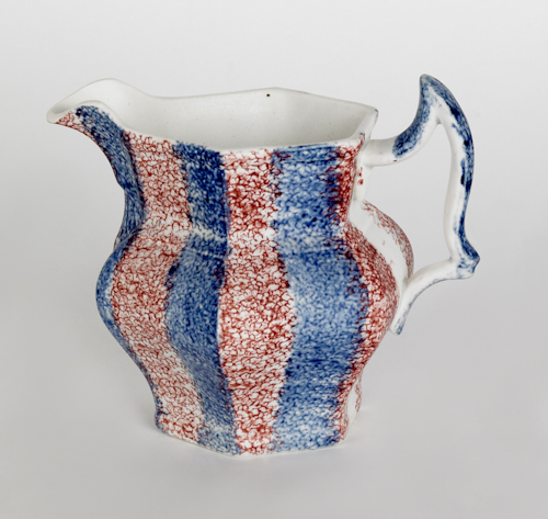 Red and blue rainbow spatter creamer