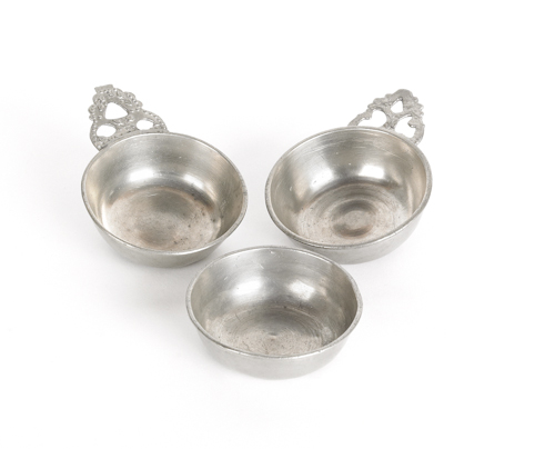 Three New England pewter porringer