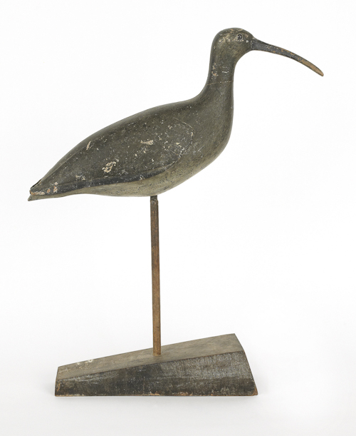 Carved and painted curlew decoy