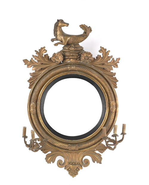 Carved giltwood girandole mirror
