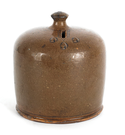 Large earthenware penny bank with