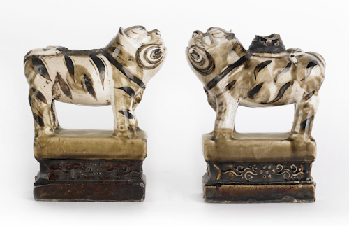 Pair of Chinese white and sepia glazed