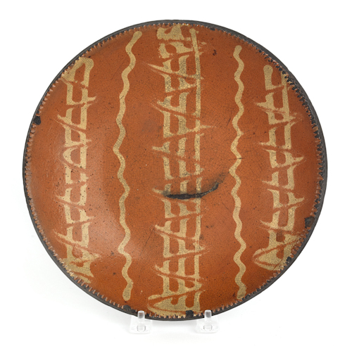 Redware plate 19th c. with yellow