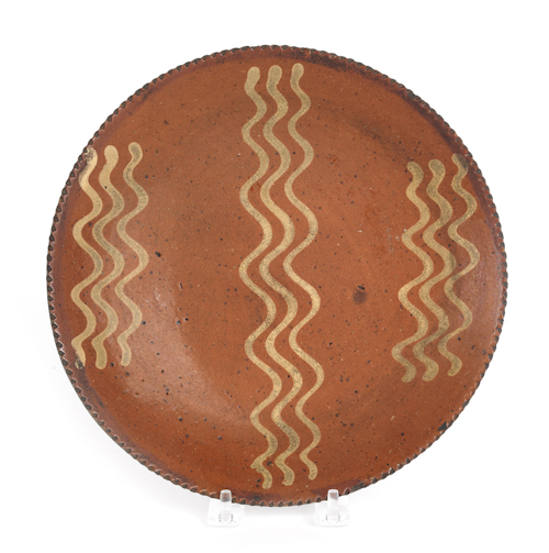 Redware plate 19th c. with yellow