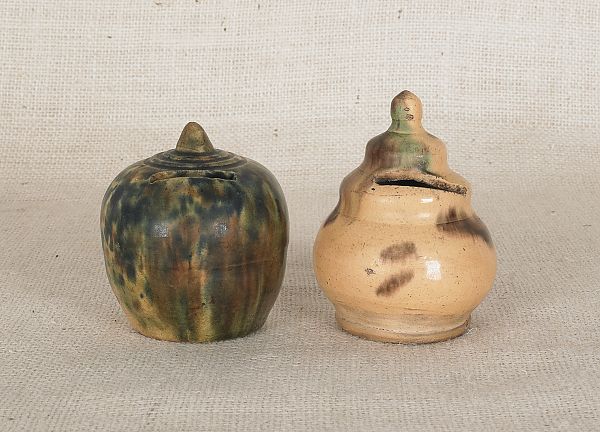 Two redware banks 19th c with 1750bf