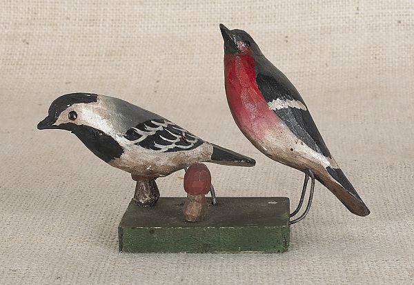 Two carved and painted song birds 1750ca