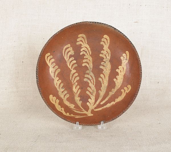Redware pie plate 19th c. with yellow