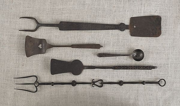 Five wrought iron utensils to include 175210