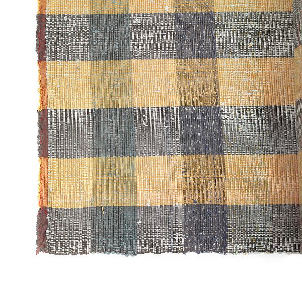 Brown and orange rag rug in a checkerboard