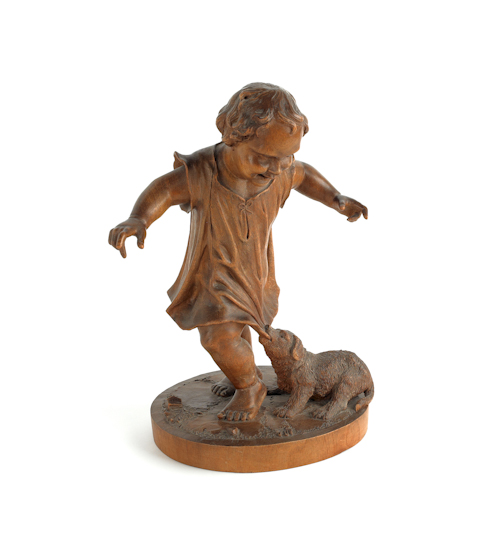 Swiss carved figure of a young