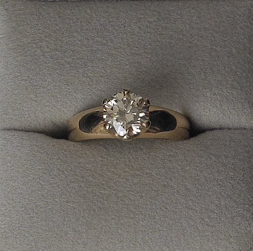 14K gold diamond ring with a round