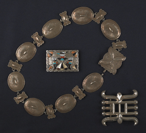 Silver concha belt together with a Zuni