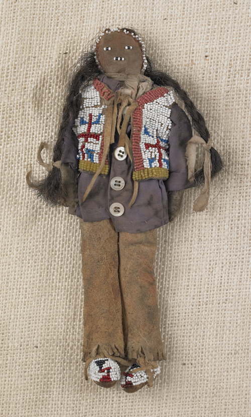 Plains beaded hide and cloth doll with