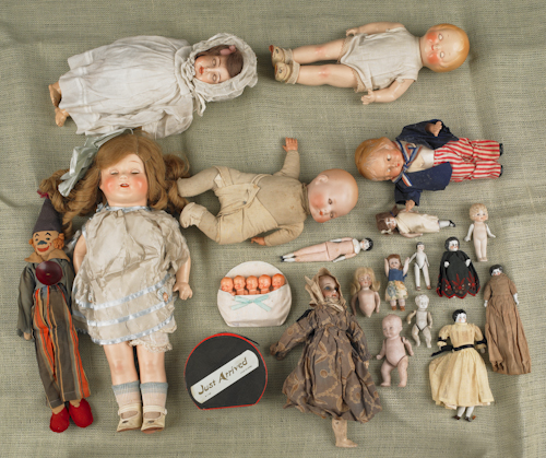 Nineteen miscellaneous dolls 19th