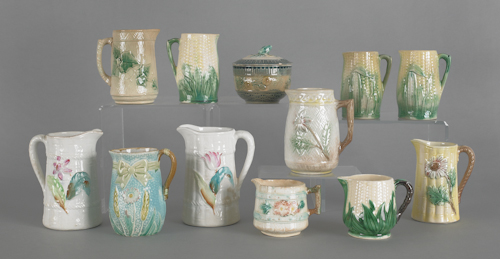 Eleven majolica cream pitchers late