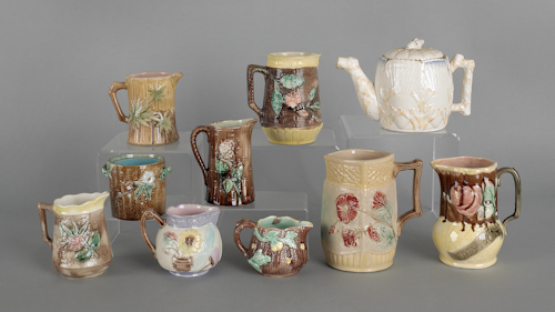 Eight majolica pitchers late 19th